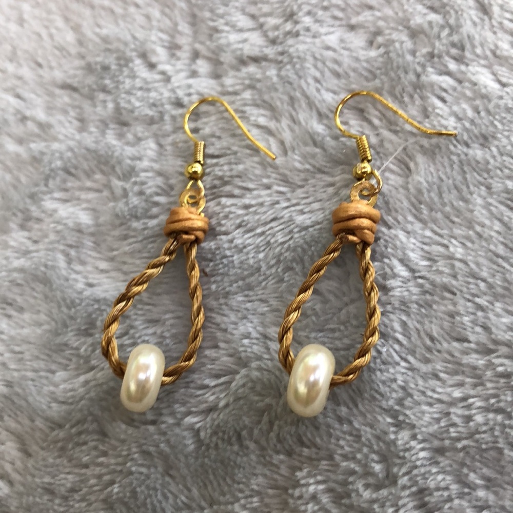 Golden Grass earrings with faux pearls and leather detail.